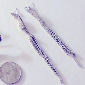 Earrings vintage 3” curvy Waterfalls, tiny prong-set clear faceted crystals post